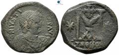 Byzantine Justin I AD 518-527. Thessalonica. 1st officina Follis Æ 33 mm., 17,92 g. D N IVSTI-[NVS P] P AVG, pearl-diademed, draped, and cuirassed bust right / Large M, cross above, star to left and r