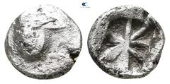 Greek Uncertain. Lycia (?) circa 500 BC. Obol AR 8 mm., 0,78 g. Animals' head with a huge eye to left / Incuse square divided into eight compartments. fine cf. Obolos 5, Lot 380.