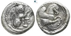Greek Dynasts of Lycia. Uncertain mint. Uncertain Dynast circa 480-460 BC. Stater AR 21 mm., 8,66 g. Lion seated to right with head facing and left foreleg raised, to right, palmette, [to left, floral