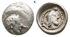 Greek Dynasts of Lycia. Uncertain mint. Kherei 440-410 BC. Obol AR 9 mm., 0,63 g. Helmeted head of Athena right / Head of Kherei right, wearing bashlyk, in dotted circular border within incuse circle.