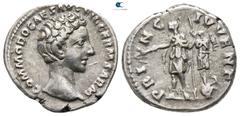 Roman Imperial Commodus, as Caesar AD 166-177. Struck AD 175-176. Rome Denarius AR 19 mm., 3,26 g. COMMODO CAES AVG FIL GERM SARM, bare head right / PRI-NC IVVENT Commodus standing left, in military d