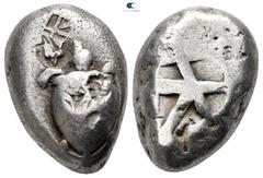 Greek Islands off Attica. Aegina circa 525-480 BC. Stater AR 20 mm., 12,24 g. Sea turtle, head in profile, [with trefoil collar], c/ms: skew pattern, uncertain and rose (?) / Small incuse square with 