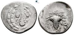 Greek Lydia. Tralleis. ΠΡΥΤANΙΣ (Prytanis), magistrate circa 123-67 BC. Cistophoric Didrachm AR 22 mm., 5,98 g. Lion skin draped over upright club within wreath / ΠΡ-ΥΤ, grape bunch on leaf, [TP]AΛ to