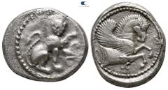 Greek Dynasts of Lycia. Uncertain mint. Uncertain Dynast 480-460 BC. Stater AR 22 mm., 9,20 g. Lion seated to right with head facing and left foreleg raised, to right, palmette / Forepart of Pegasos t