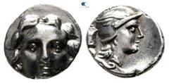 Greek Pisidia. Selge circa 250-190 BC. Obol AR 10 mm., 1,03 g. Gorgoneion with flowing hair / Head of Athena right, wearing winged and crested Attic helmet, astragalos and coiled serpent behind. very 