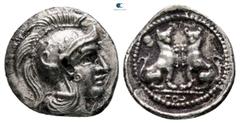 Greek Dynasts of Lycia. Tlos circa 400-380 BC. Time of Wekhssere I Diobol AR 13 mm, 1,41 g Helmeted head of Athena right / Two panthers seated facing one another, each raising forepaw and with heads f