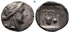 Greek Lycia. Olympos. Lycian League circa 167-81 BC. Hemidrachm AR 16 mm, 2,83 g Laureate head of Apollo right / ΟΛYMΠΗ, kithara, torch to lower left, sword and shield to lower right, all within incus