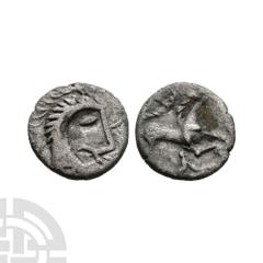 Celtic Iron Age Coins - Iceni - Norfolk God Variant Type - AR Unit 1st century A.D. Obv: male head right with short dashes for hair and crescents behind, trefoils before. Rev: horse right with pelta a