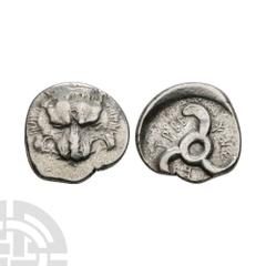 Ancient Greek Coins - Lycia - Trbbanimi - Triskeles AR Fraction 390-385 B.C. Triobol or tetrobol. Obv: lion's scalp facing. Rev: Lycian legend TRBBWNEME with triskeles rotating left. Traité II-2, 475;