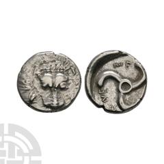 Ancient Greek Coins - Lycia - Trbbenimi - Lion Scalp AR 1/3 Stater 390-370 B.C. Obv: facing lion scalp. Rev: Lycian script TRB-BWNE-ME around triskeles rotating left, within incuse circle. Traité II-2
