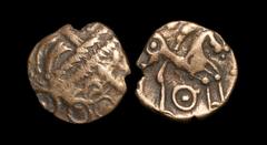 Celtic Iron Age Coins - Iceni - Snettisham Wreath Gold Quarter Stater 50-40 BC Obv: wreath motif with crescents and annulets. Rev: annulate horse right with pellet-in-annulet below. 0.99 grams. (). "T