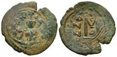 Heraclius and Heraclius Constantine - Follis. 610-641 AD. Constantinople mint, overstruck on an earlier coin. Obv: Heraclius (partially obliterated), crowned, with moustache and long beard, holding lo