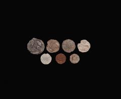 Antiquities - Medieval Fair condition. Medieval Boy Bishop and Other Tokens Group 14th-16th century AD. Group comprising lead or pewter items: Boy Bishop tokens (3; 2 penny size, 1 groat); with other 