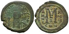 Coins - Byzantine Ancient Byzantine Coins - Justinian I - Large M Follis. 527-565 AD. Constantinople mint. Obv: IVSTINIANVS P P AVG legend with helmeted and cuirassed bust facing holding globus crucig