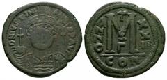 Coins - Byzantine Ancient Byzantine Coins - Justinian I - Large M Follis. 527-565 AD. Constantinople mint, year 22. Obv: DN IVSTINIANVS PP AVG legend with helmeted and cuirassed bust facing, holding c