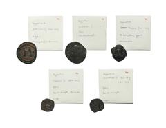 Coins - Byzantine Ancient Byzantine Coins - Justinian I to Justinian II - Bronze Issues [5]. 6th-7th century AD. Group comprising: Justinian I, folles (2); Phocas, half follis; Tiberius III, follis; J