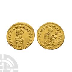Coins - Saxon and Viking Iberia - Visigoths - Imitative Gold Tremissis. 6th-7th century A.D. Copying an issue of Justinian. Obv: profile bust right with DN IVSTINIANVS P AVG legend. Rev: Victory advan