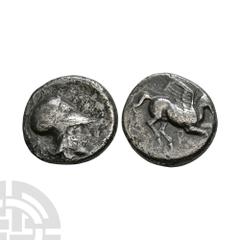 Coins - Greek Corinth - Pegasus AR Stater. 404-345 B.C. Obv: Pegasus with straight wings flying right, Koppa below. Rev: helmetted head of Athena right, chimera(?) behind head. Calciati 228; Ravel 532