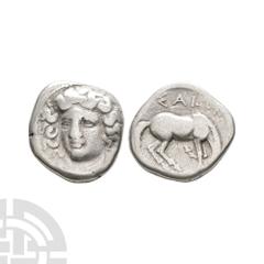 Coins - Greek Thessaly - Larissa - Horse AR Drachm. 400-380 B.C. Obv: facing head of the nymph Larissa, turned slightly to the right, wearing ampyx, drop earrings, and a necklace with a central pendan