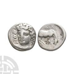 Coins - Greek Thessaly - Larissa - Horse AR Drachm. 400-380 B.C. Obv: facing head of the nymph Larissa, turned slightly to the right, wearing ampyx, drop earrings, and a necklace with a central pendan