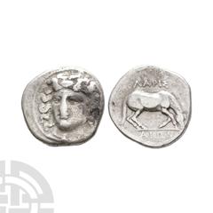 Coins - Greek Thessaly - Larissa - Horse AR Drachm 400-380 B.C. Obv: facing head of the nymph Larissa, turned slightly to the right, wearing ampyx, drop earrings, and a necklace with a central pendant