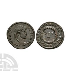 Coins - Roman Imperial Crispus - Wreath Bronze 320-321 A.D. Struck under Constantine I, Siscia mint. Obv: IVL CRISPVS NOB C legend with laureate bust right. Rev: CAESARVM NOSTRORVM legend with VOT / V