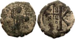 Coins - Ancient World Byzantium Justinian I 20 Nummi 529 - 565 AD (ND) SB# 225, N# 133306; 3rd officina; Bronze 8.77 g.; Obv: Justinian enthroned facing, holding long sceptre and globus cruciger. D N 
