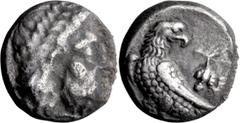 Ancient Greek . Alexandria Diobol; ; 305-294 BC, Diobol, 1.14g. SNG ANS-20, HGC-12. Obv: Local issue, laureate head of Zeus right. Rx: eagle standing left, head turned right, with wings folded, branch