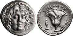 Ancient Greek Caria, Rhodes. Didrachm; Caria, Rhodes; c. 250-230 BC, Didrachm, 6.78g. SNG Keckman-540. Obv: Head of Helios facing, 3/4 r. Rx: Rose; Athena standing in l. field; above, magistrate's nam