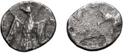 Judaea, Yehud Coin under Persian Rule; Hemiobol, Before 333 BCE, 0.21g. Hendin-429, Meshorer AJC I-9b, TJC-16d. Obv: Blank. Rx: Falcon with spread wings, head l., traces of inscription on right. It is