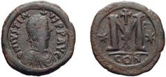 Byzantine Justin I. Follis; Justin I; 518-527 AD. Constantinople, Follis, 17.80g. Berk-41, MIB-11, Sear-62. Obv: D N IVSTIN - VS PP AVG Diademed bust r., cross above. Rx: Large M between two stars, cr