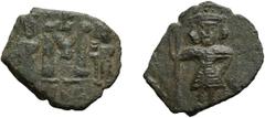 Byzantine Constantine IV. Follis; Constantine IV; 654-685 AD. Syracuse, c. 674-681 AD, Follis, 2.95g. Berk-740, DO-62, Sear-1209. Obv: Constantine IV standing facing, wearing helmet and cuirass and ho