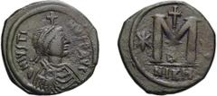Byzantine Justin I. Follis; Justin I; 518-527 AD. Nicomedia, Follis, 16.82g. Berk-65, MIB-35, Sear-83. Obv: D N IVSTI - NVS PP AVG Diademed bust r., cross above. Rx: Large M between two stars, cross a