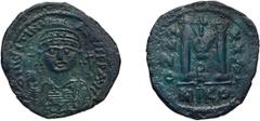 Byzantine Justinian I. Follis; Justinian I; 527-565 AD. Nicomedia, Year 29=555/6 AD, Officina B=2, Follis, 16.64g. Sear-201, Berk-227. Obv: D N IVSTINI - ANVS PP AVG Helmeted and cuirassed bust facing