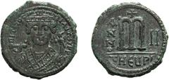 Byzantine Maurice Tiberius, 582-602 AD. Follis; Maurice Tiberius, 582-602 AD; Antioch, Year 2 = 583/4 AD, Follis, 12.40g. Berk-461, Sear-532, MIB-95AB, DO-153. Obv: Helmeted and cuirassed bust facing,
