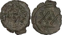 Byzantine Copper Focas. Half-follis; Focas; 602-610 AD. Ravenna, c. 607-609 AD, Half Follis (20 Nummi), 3.62g. MIB-113, Berk-527, Sear-707, DO-135. Obv: D N FOCA - PERP AVG Crowned bust facing, with b