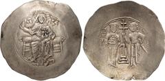 Byzantine John II. Aspron EL Trachy Nomisma; John II; 118-1143 AD. Constantinople, EL Aspron Trachy, 4.40g. Berk-344, Sear-1942. Obv: Christ seated facing on throne. Rx: John II and Saint George stand