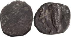 Ancient Greek Macedonian Period, c. 333-302 BCE. ; Macedonian Period, c. 333-302 BCE; c. 330-302 BCE, Mint in or near Jerusalem, Half-Ma\'ah-Obol, 0.26g. Cf. Hendin-6067. Obv: Blank. Rx: Forepart of w