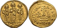 Extremely Fine; boasting lustrous, bright metal | BYZANTINE EMPIRE. Heraclius. Gold solidus, dated IY 12 = AD 638/9. Constantinople. Obv: Heraclius flanked by Heraclius Constantine and Heraclonas, all