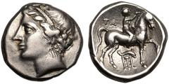 MAGNA GRAECIA. CALABRIA, TARENTUM. Silver nomos, circa 281-228 BC. 'Campano-Tarentine' series. Obv: head of nymph left, wearing tainia and triple pendant earring. Rev: nude youth on horseback right, c