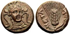 MAGNA GRAECIA. LUCANIA, METAPONTION. Bronze 16mm, circa 300-250 BC. Obv: bust of Athena facing slightly right, wearing triple-crested Attic helmet. Rev: grain ear with leaf right; META upwards to left