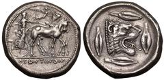 MAGNA GRAECIA. SICILY, LEONTINI. Silver tetradrachm, circa 476-466 BC. Obv: charioteer, holding kentron and reins, driving walking quadriga to right; above, Nike flying right and crowning horses; ΛEON