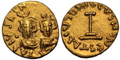 BYZANTINE EMPIRE. ARAB-BYZANTINE, UMAYYAD CALIPHATE. Gold Tremissis - 1/3 Dinar, circa AH 77-132 = AD 697-750. Uncertain North African mint (Carthage?). Imitating the types of Heraclius. Obv: [...]T A