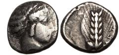 MAGNA GRAECIA. LUCANIA, METAPONTION. Silver Nomos, circa 430-400 BC. Obv: head of Demeter right. Rev: barley ear of six grains, leaf to left, META to right. Very Fine; obverse scraped. Reference: Noe-