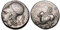 ANCIENT GREECE. CORINTHIA, CORINTH. Silver Stater, circa 350-285 BC. Obv: Pegasos flying left, Ϙ below. Rev: head of Athena left, wearing Corinthian helmet; Δ-I flanking neck; to right, facing herm wi