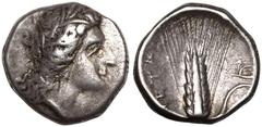 Magna Graecia MAGNA GRAECIA. LUCANIA, METAPONTION. Silver Stater, circa 330-290 BC. Dai- and Mach-, magistrates. Obv: wreathed head of Demeter right, wearing triple pendant earring and necklace; ΔAI u
