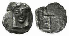 A selection of fractions and Arabian coins Ionia, Kolophon, c. 500-450 BC, Tetartemorion, 0.22g, 6mm. Facing head of Apollo / TE monogram within incuse square. Milne, Colophon 10; SNG Copenhagen 133-4