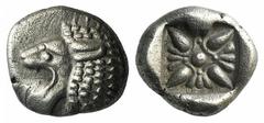 A selection of fractions and Arabian coins Ionia, Miletos, late 6th-early 5th century BC, Diobol, 1.08g, 9mm. Forepart of lion right, head left / Stellate design within incuse square. SNG Kayhan 476-8