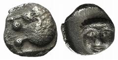 Greek Satraps of Caria, Hekatomnos, c. 392/1-377/6 BC, Tetartemorion, 0.20g, 5mm. Forepart of a roaring lion left / Laureate head of Apollo facing slightly left. Cf. Klein 507. Very fine.