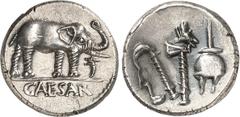 EMPIRE ROMAIN EMPIRE ROMAIN Jules César (60-44 av. J.C.). Denier, 49 av. J.C., Italie ou Gaule. Av. Caesar Eléphant passant à droite ; à ses pieds un serpent ou un carnyx. Rv. Instruments pontificaux 
